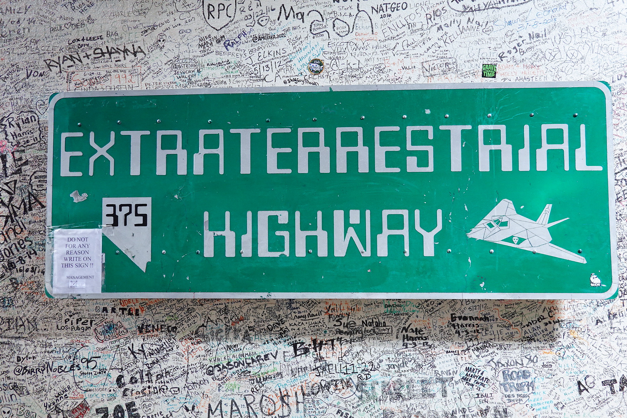 The Alien Research Center in Hiko NV has stoken the highway sign