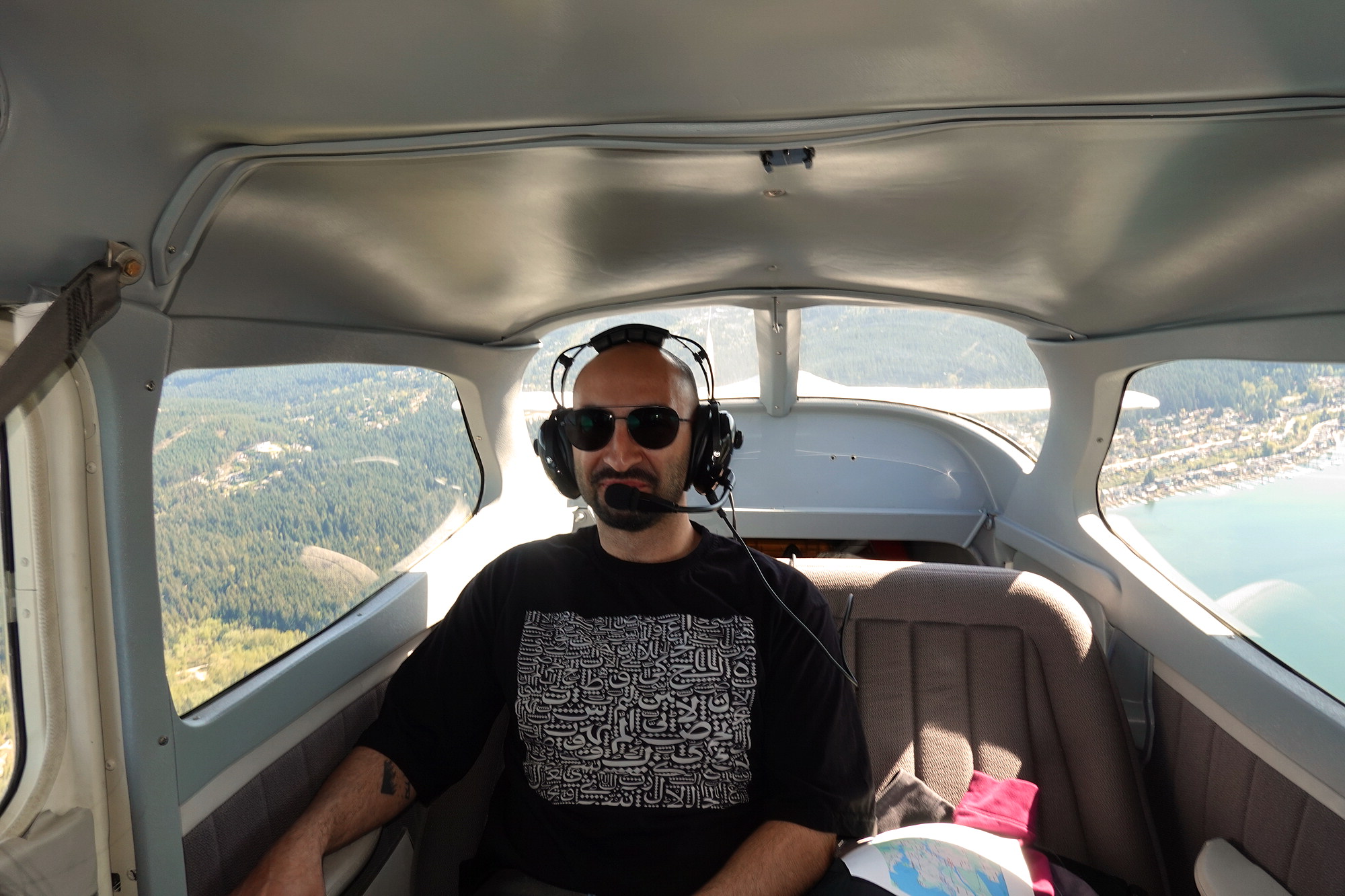 Shahab doesn't see too concerned about his wife flying the plane.