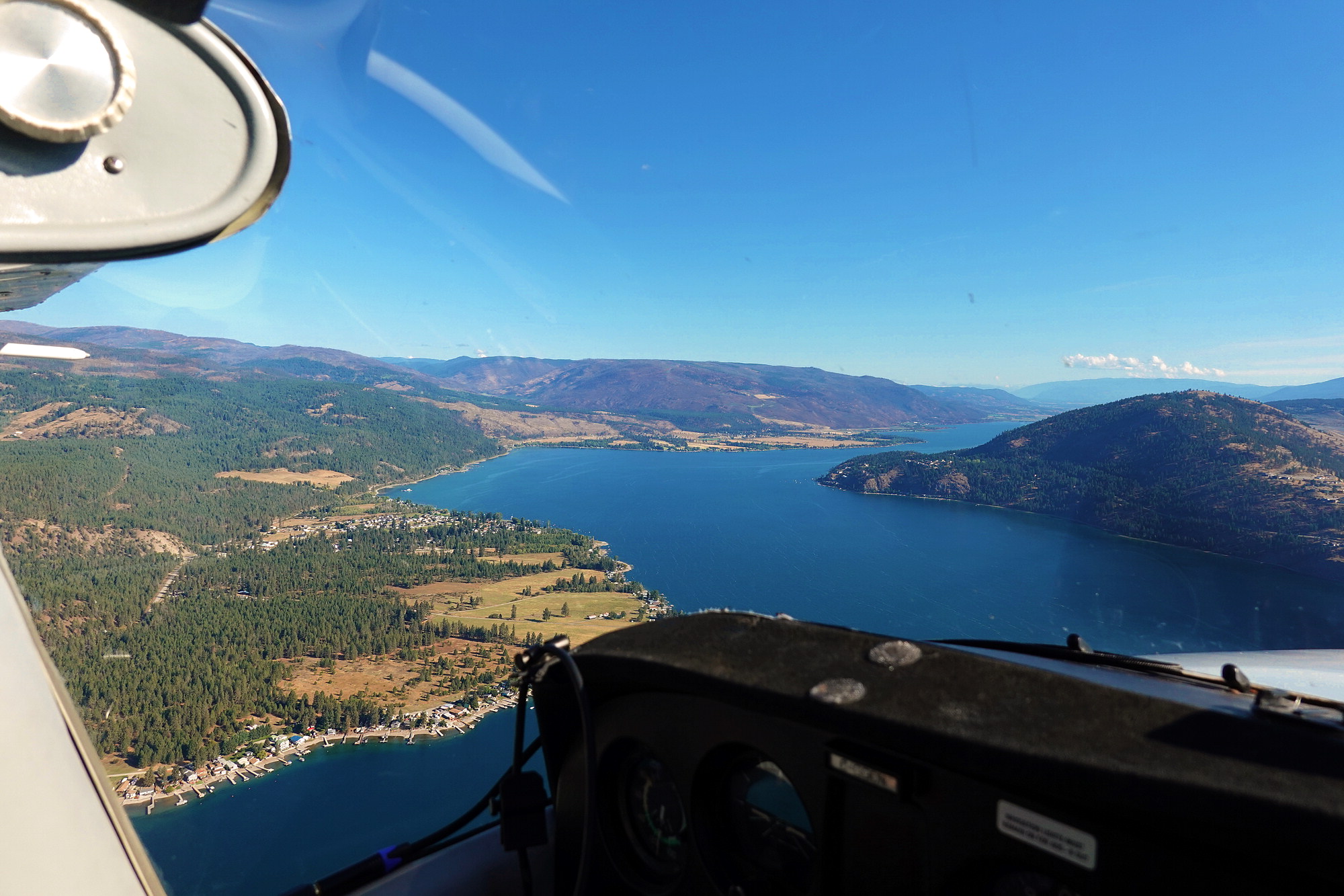 Arriving over Okanogan Lake - making the steep descent to Vernon